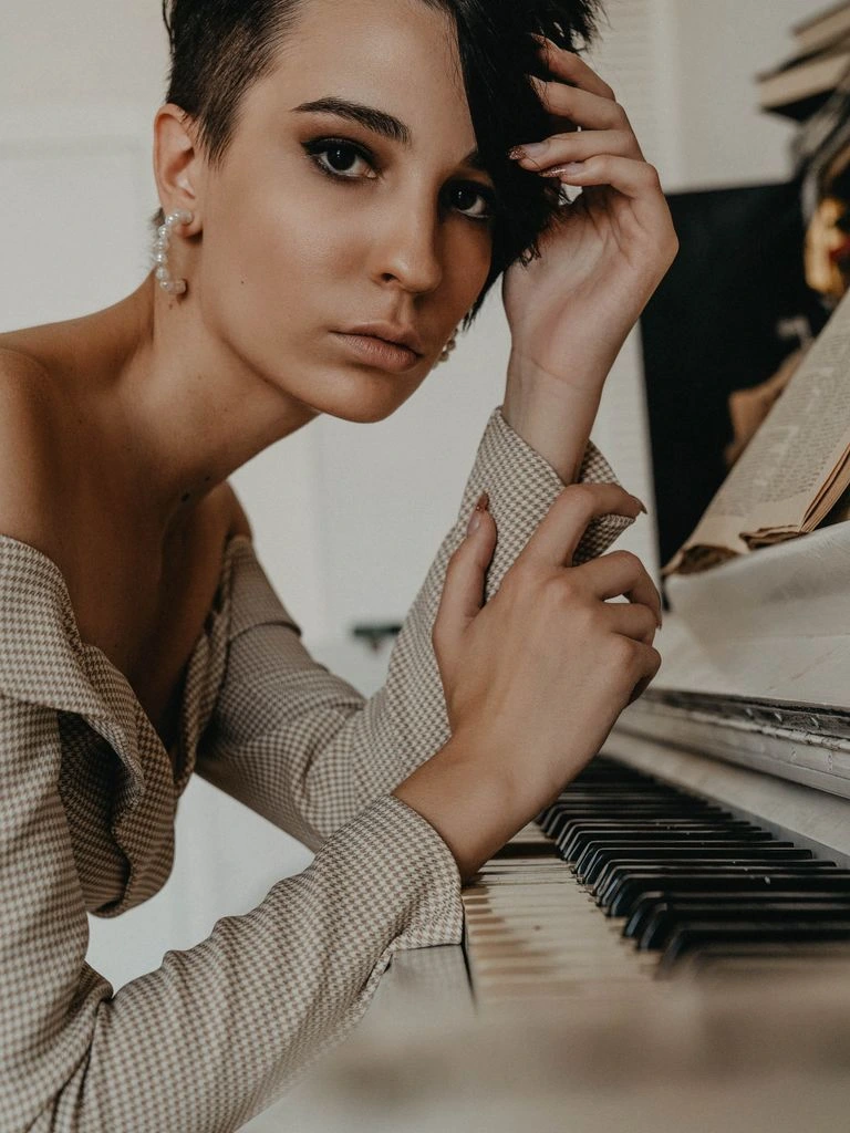 Rafael Mendoza seated at the Steinway grand in the Timba salon
